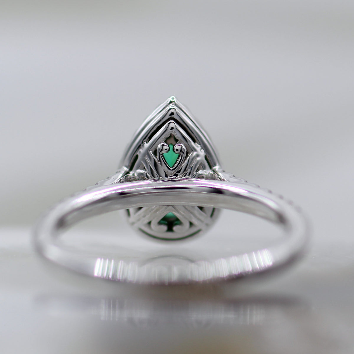 14K White Gold Pear Shape Halo Style Emerald and Diamond Ring