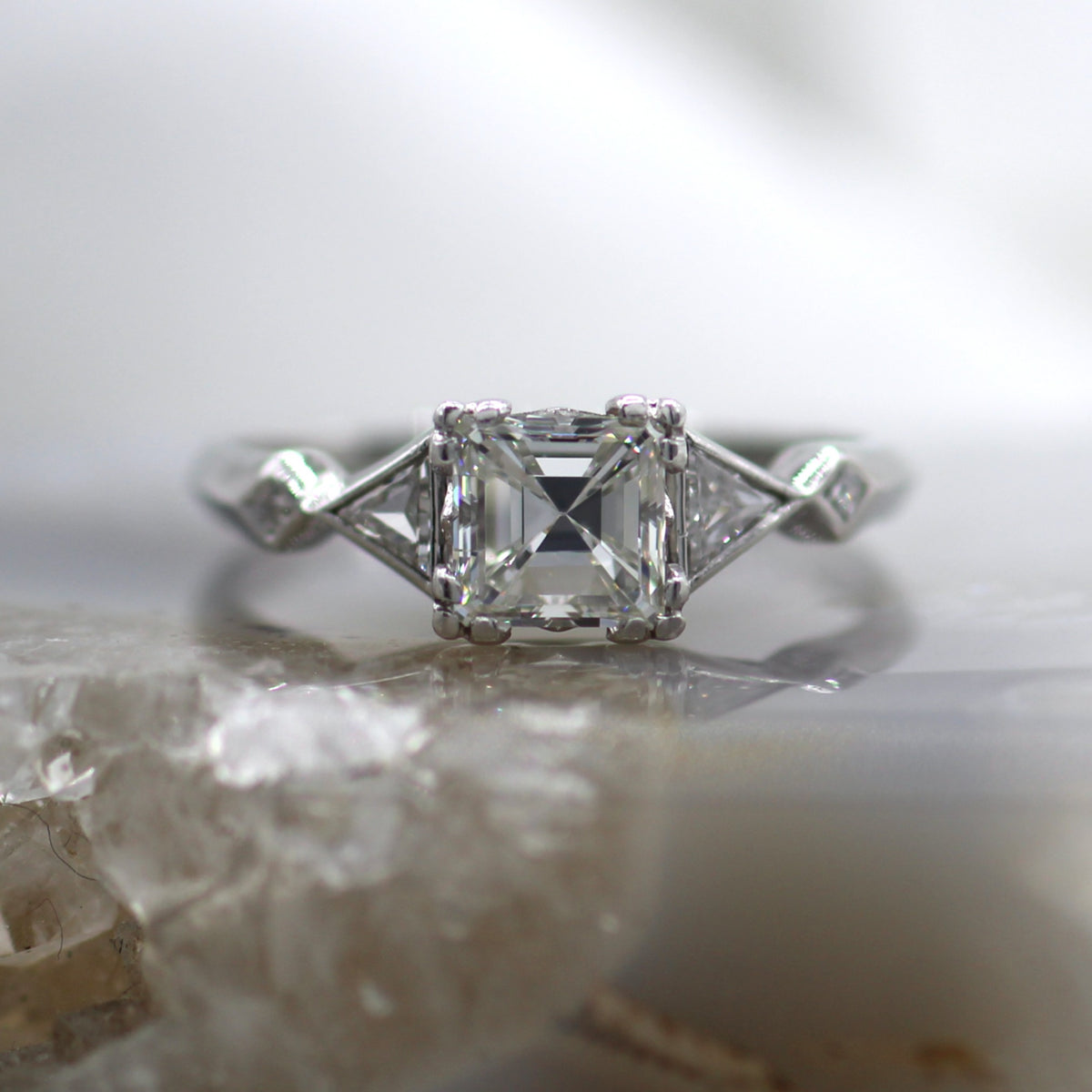 Platinum Vintage Asscher Cut Three Stone with Triangle Side Stones Engagement Ring