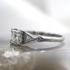 Platinum Vintage Asscher Cut Three Stone with Triangle Side Stones Engagement Ring