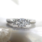 Platinum Three Stone Engagement Ring with Round Diamonds