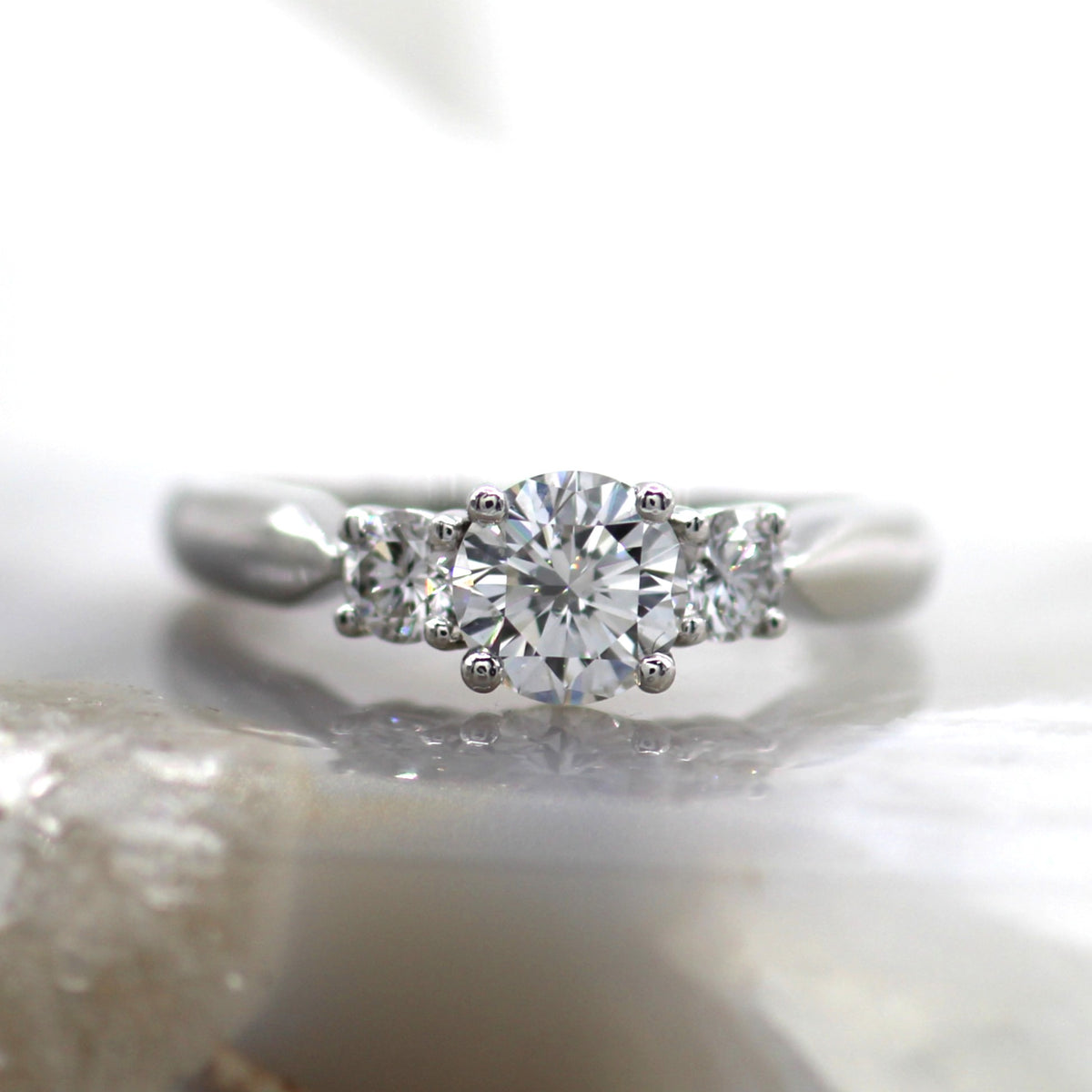 Platinum Three Stone Engagement Ring with Round Diamonds