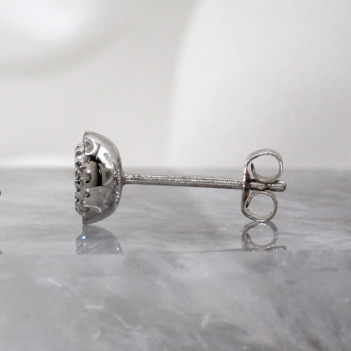 14K White Gold Tanzanite and Diamond Halo Style Stud earrings