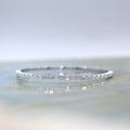 18K White Gold Hinged Bangle with Emerald Cut Diamonds