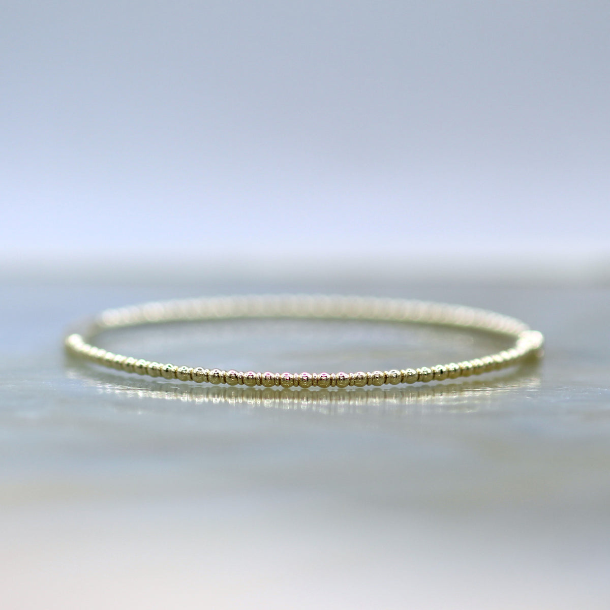 14K Yellow Gold Beaded Three Stone Diamond Flex Bangle Bracelet