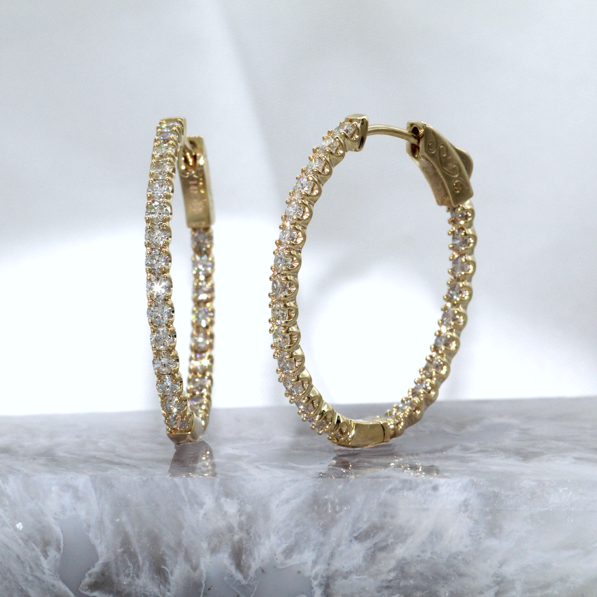 14K Yellow Gold Diamond In and Out Oval Hoop Earrings