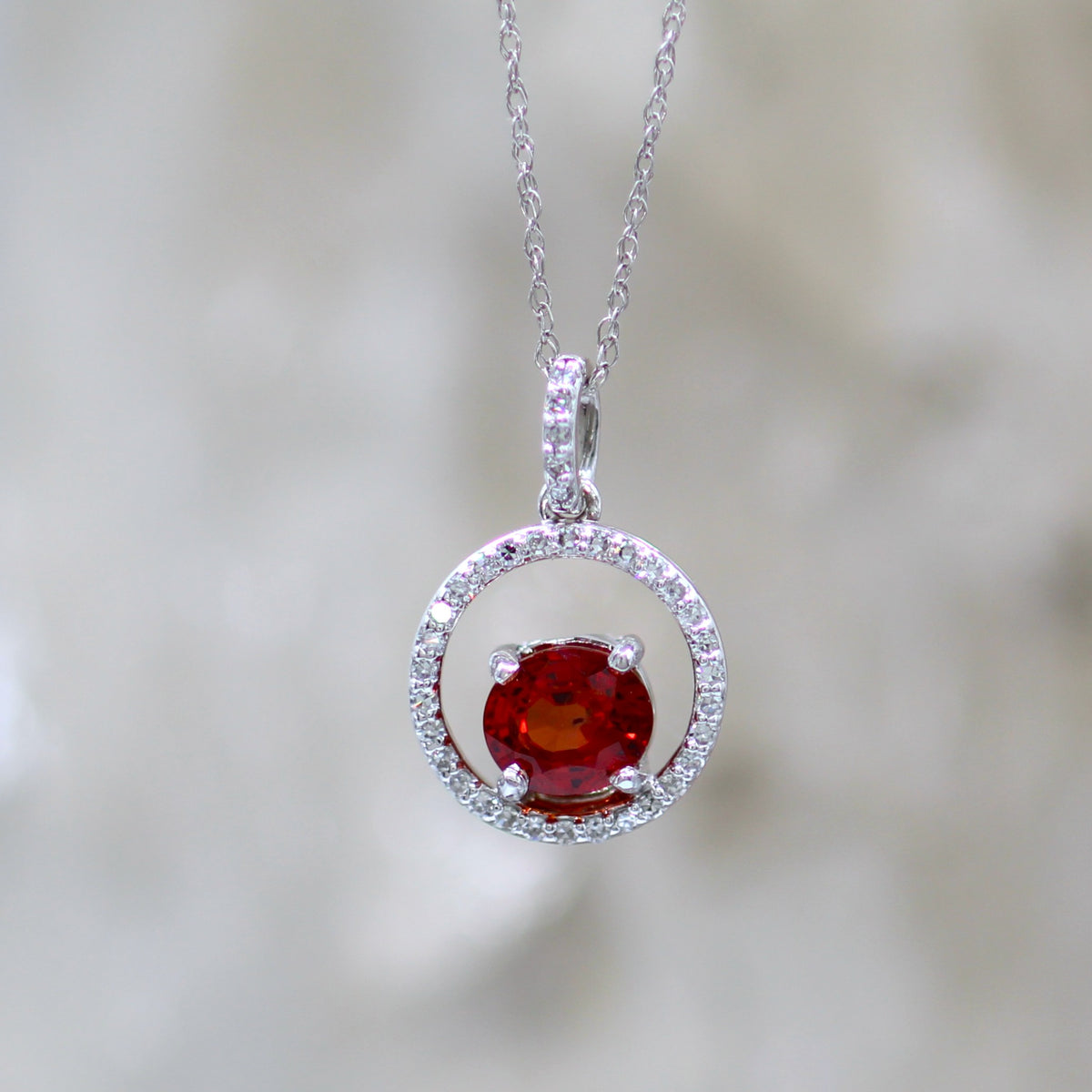 14K White Gold Floating Halo Orange Sapphire and Diamond Pendant